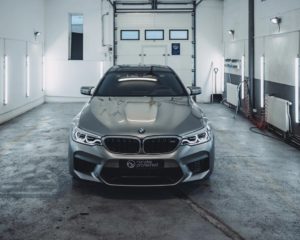 modern garage interior with silver bmw car