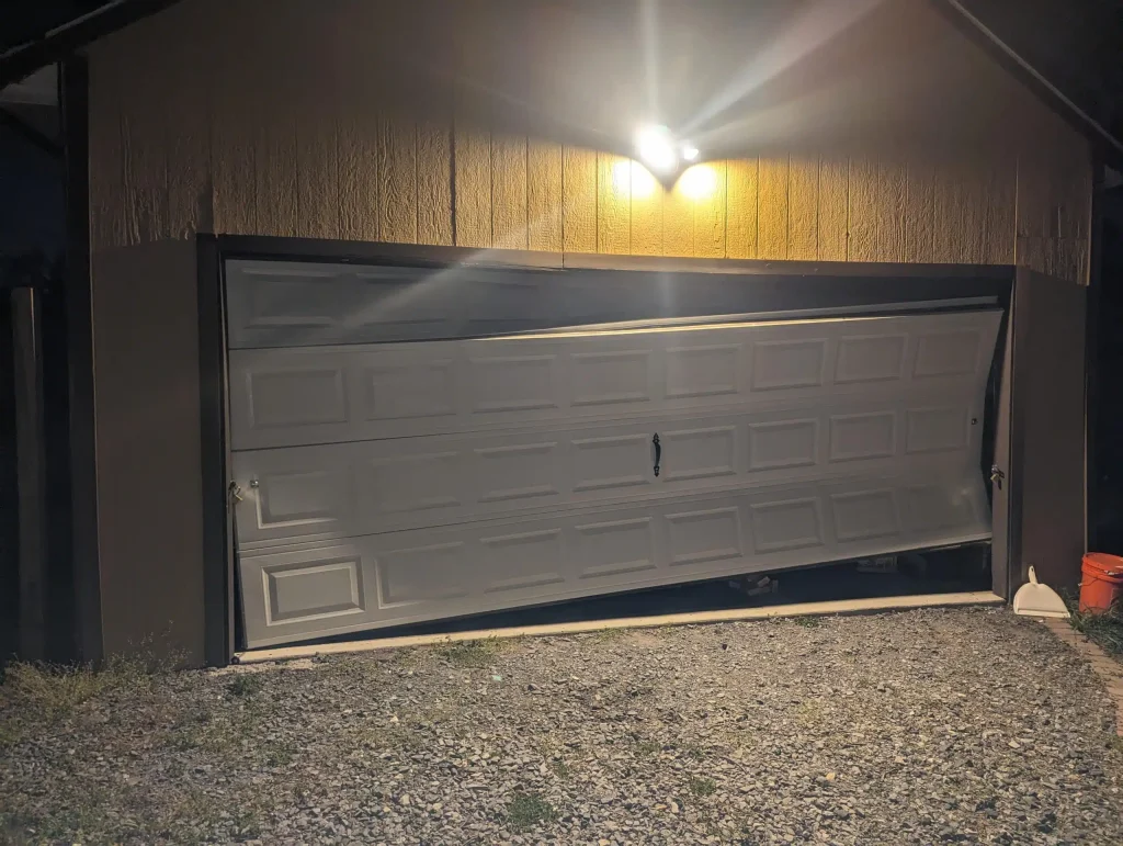 What to Do Immediately to Reduce Safety Risks When Your Garage Door Goes Off Track